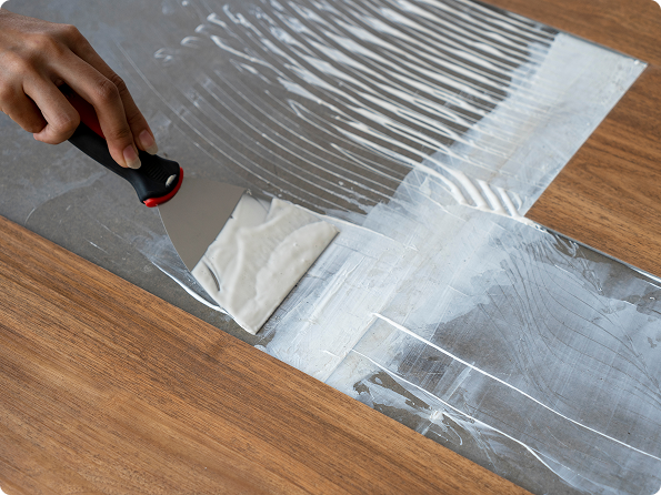 Luxury vinyl plank flooring installation method showing click-lock and glue-down options