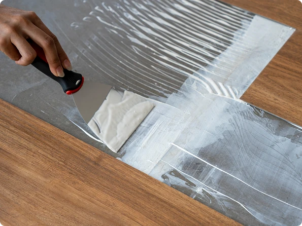 Luxury vinyl plank flooring installation method showing click-lock and glue-down options