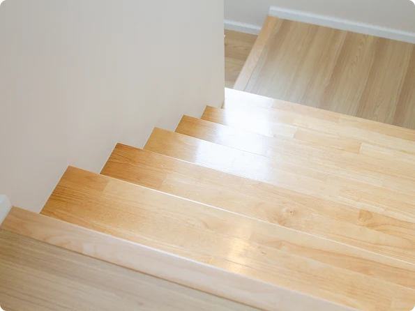 Flooring installation across stairs and multiple connected rooms for whole-home updates by Five Star Flooring